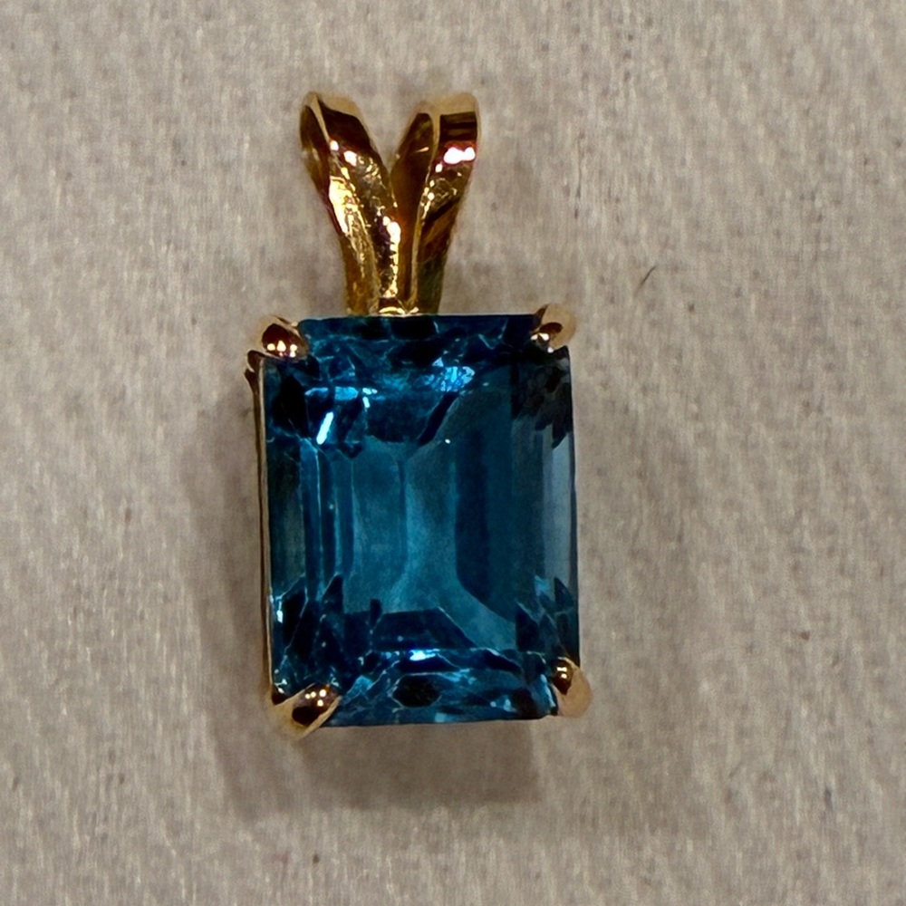 14K Yellow Gold Emerald Cut Blue Topaz Pendant